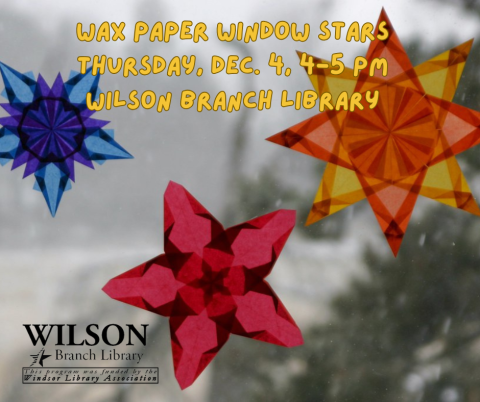 colorful wax window stars on window 