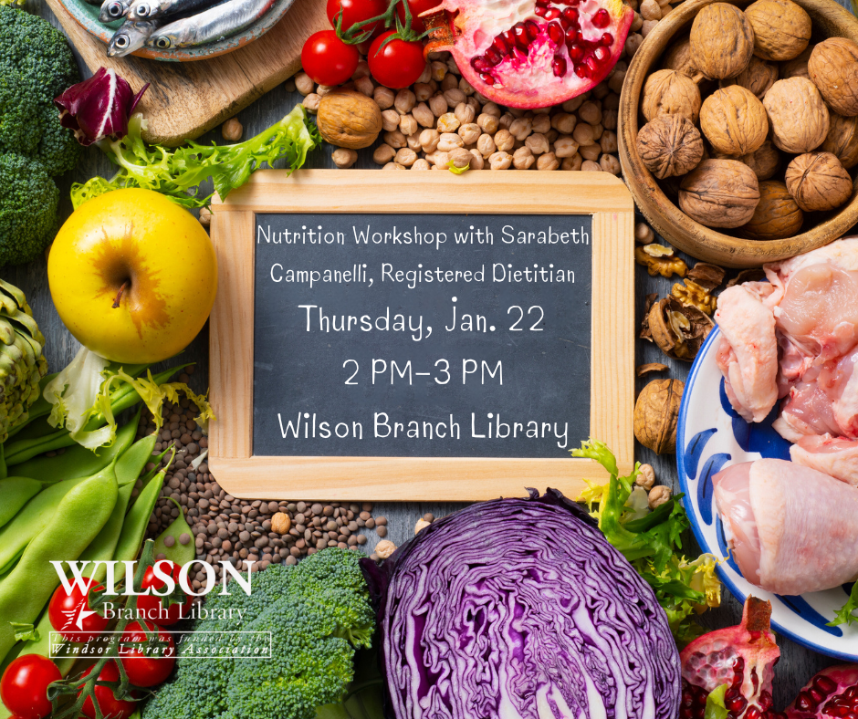fruits and vegetables around chalkboard